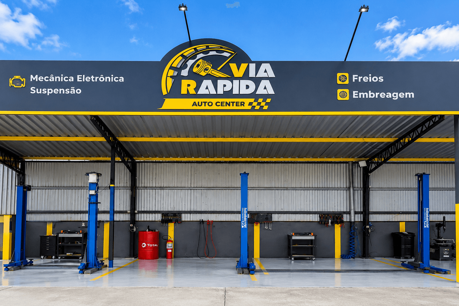 Box da oficina com quatro elevadores
